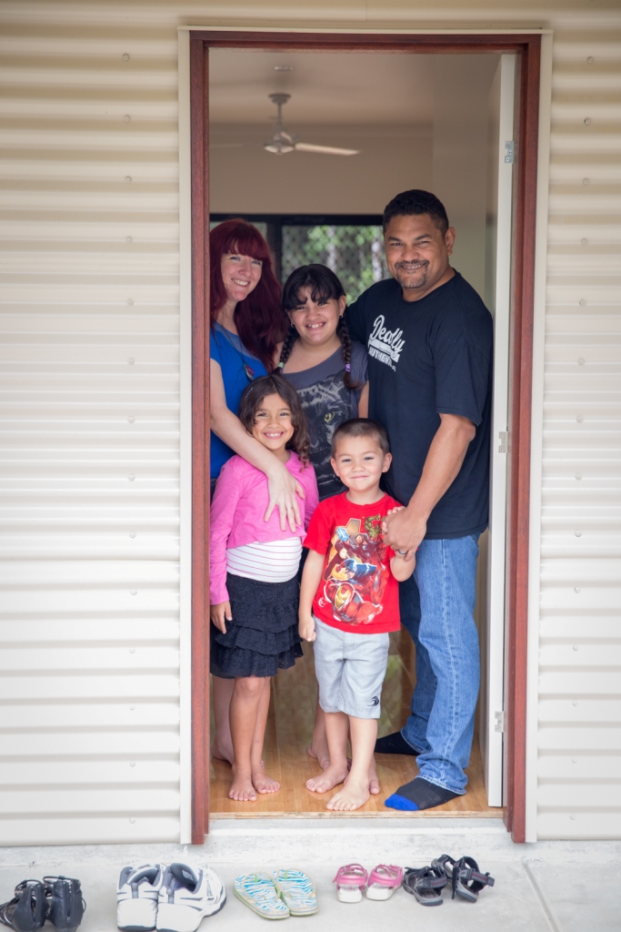 Wayne and Lucy McGinness and their children at their newly constructed home in Far North Queensland.